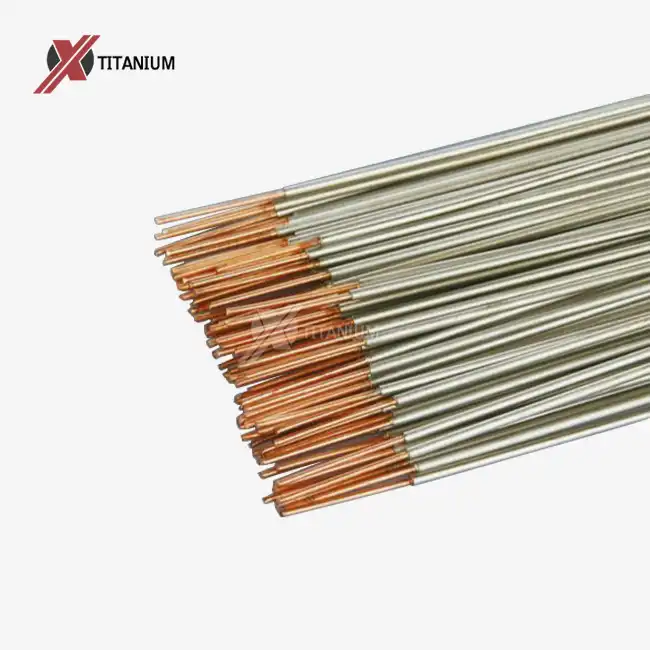 What are the primary benefits of using titanium-clad copper wire?
